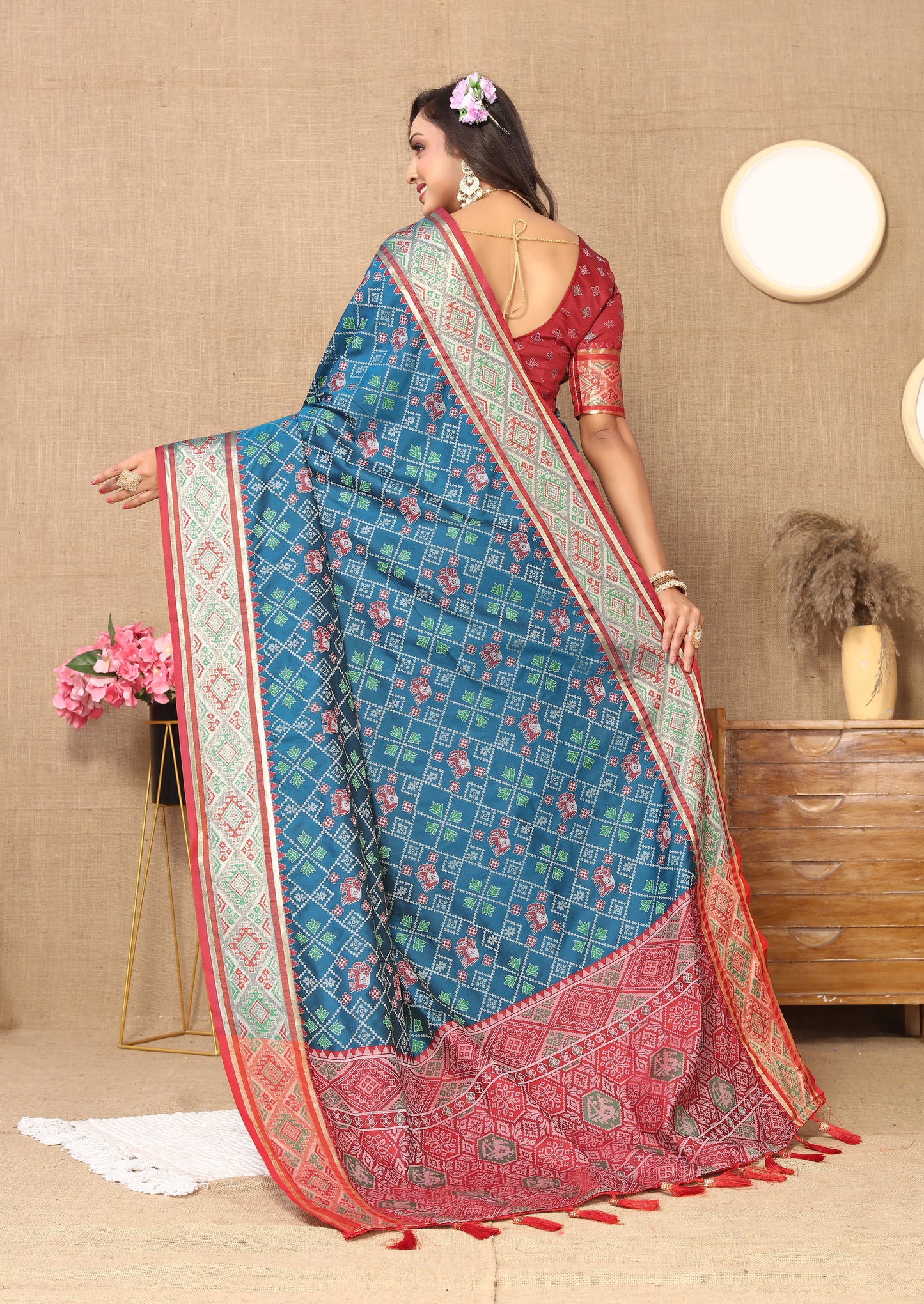 Blue & Maroon Color Women's Soft Patola Silk meenakari weawing motifs with Rich Zari Pallu and contrast border with Tessels.