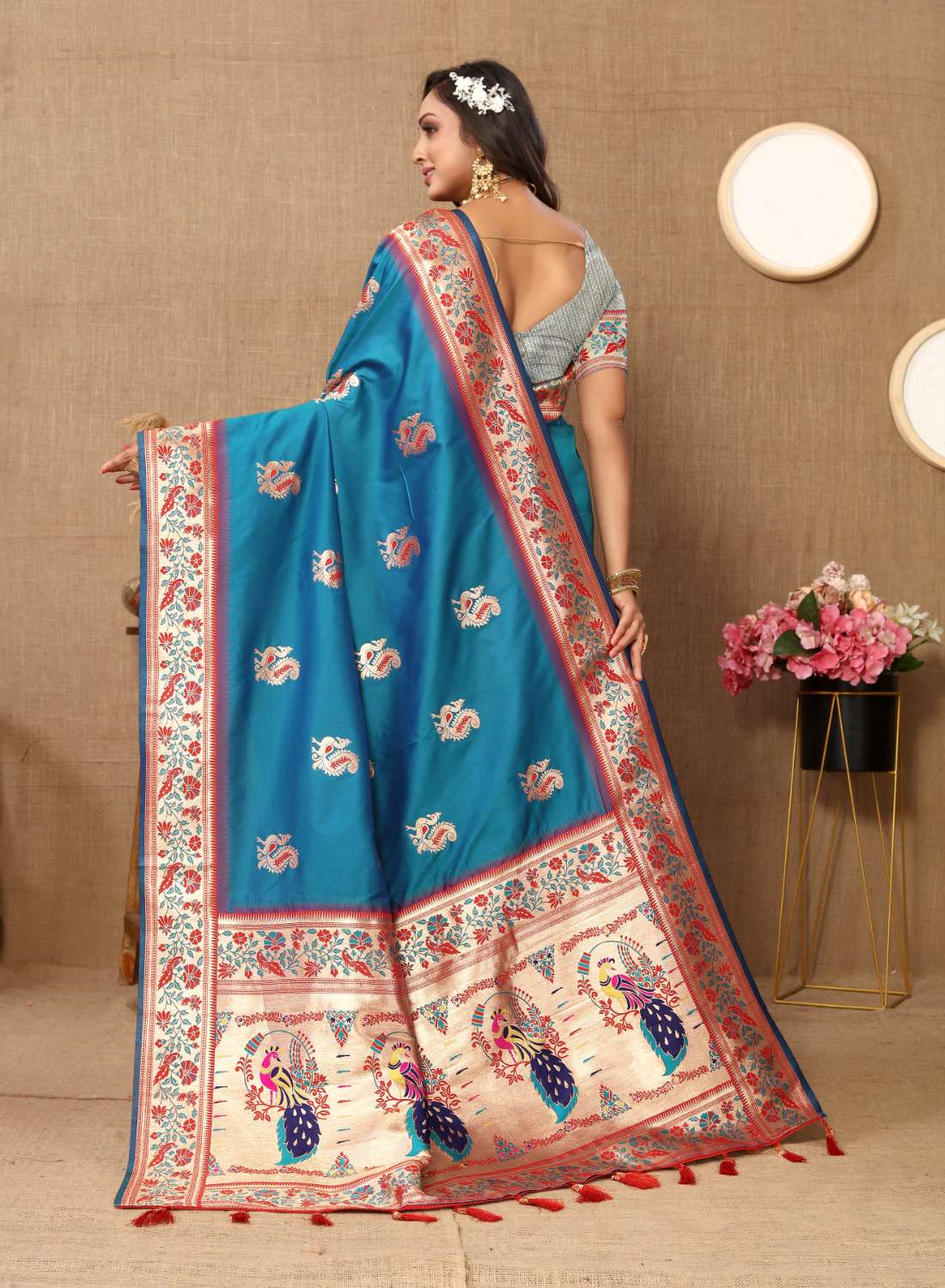 Aqua Blue Color Zari Woven Soft Paithani Silk Sarees With Rich Weaving Pallu with tassels.