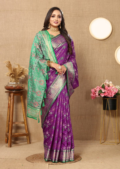 Purple & Green Color Women's Soft Patola Silk meenakari weawing motifs with Rich Zari Pallu and contrast border with Tessels.