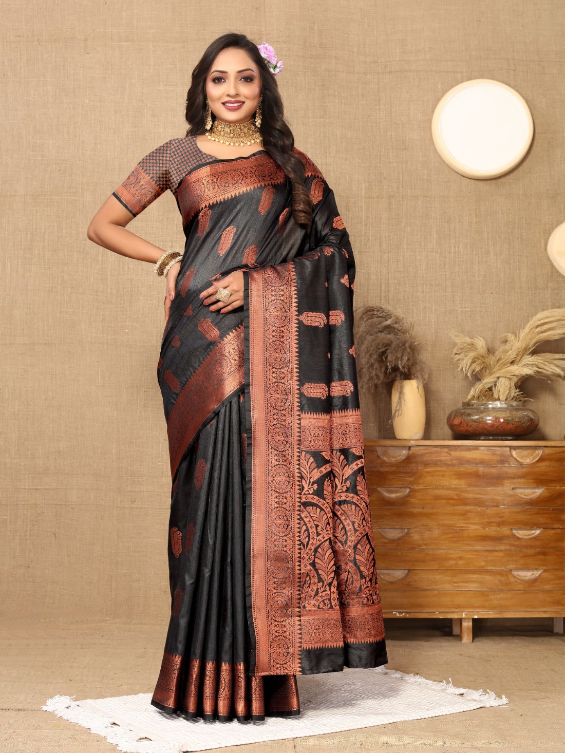 Black Color Soft  katan silk saree with copper zari weawing design and Rich Zari weawing Pallu with Unstiched Blouse piece.