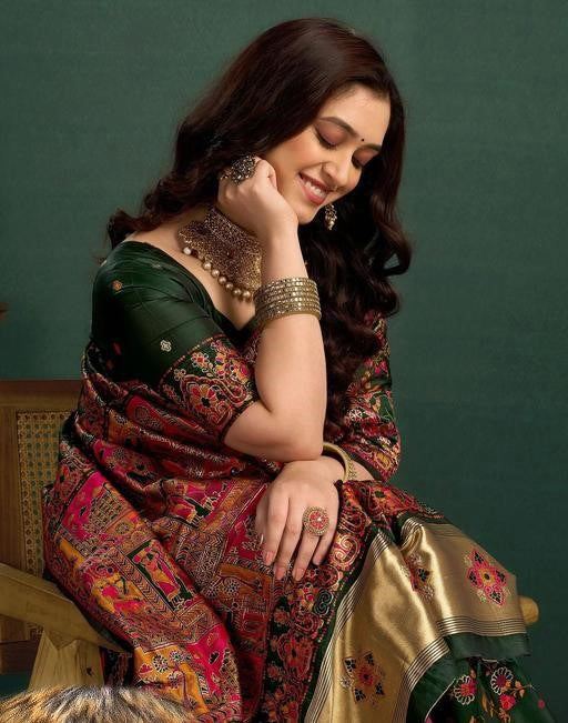 Women's Dark Green Patola Silk Saree with Traditional Floral Weaving & Rich Heritage Pallu