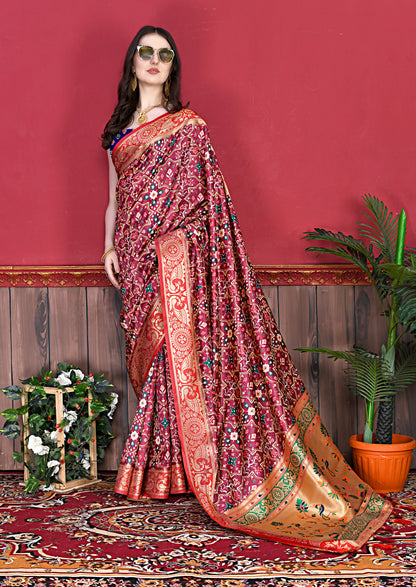 Maroon Color Women's Soft Patola Silk meenakari weawing motifs with Rich Zari Pallu and contrast border with Tessels.