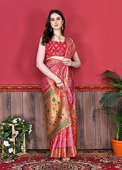 Pink Color Women's Soft Patola Silk meenakari weawing motifs with Rich Zari Pallu and contrast border with Tessels.