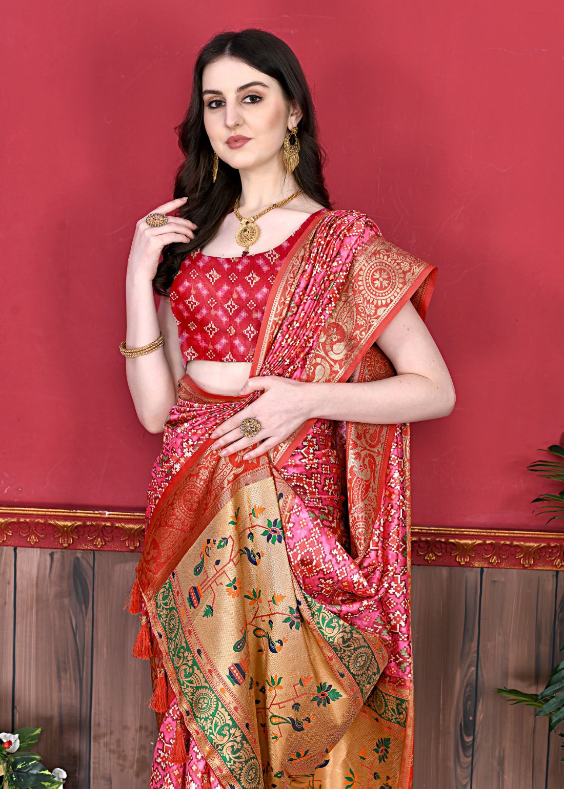 Pink Color Women's Soft Patola Silk meenakari weawing motifs with Rich Zari Pallu and contrast border with Tessels.