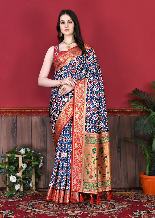 Nevy Blue Color Women's Soft Patola Silk meenakari weawing motifs with Rich Zari Pallu and contrast border with Tessels.