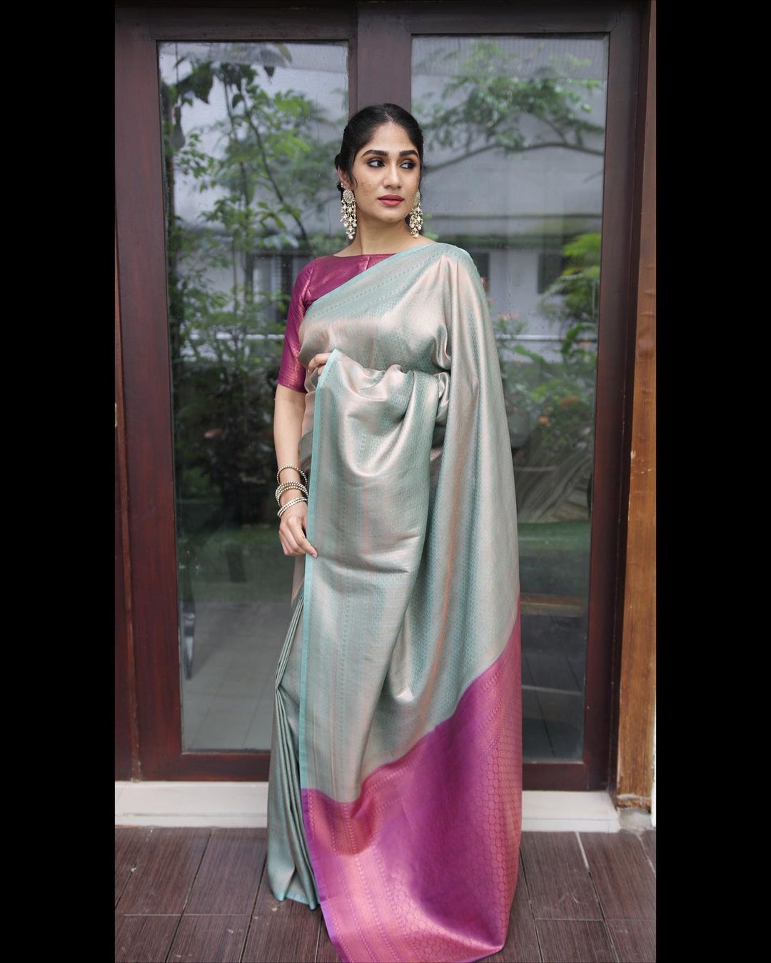 Magenta and Sky-blue Pure Banarasi Silk Saree With Twirling Blouse Piece.