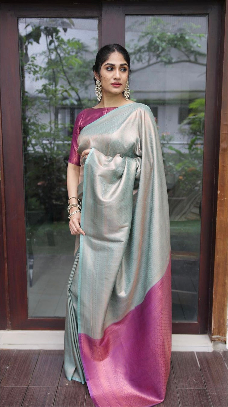 Magenta and Sky-blue Pure Banarasi Silk Saree With Twirling Blouse Piece.