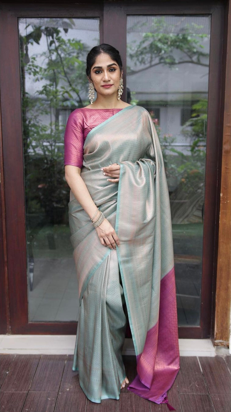 Magenta and Sky-blue Pure Banarasi Silk Saree With Twirling Blouse Piece.