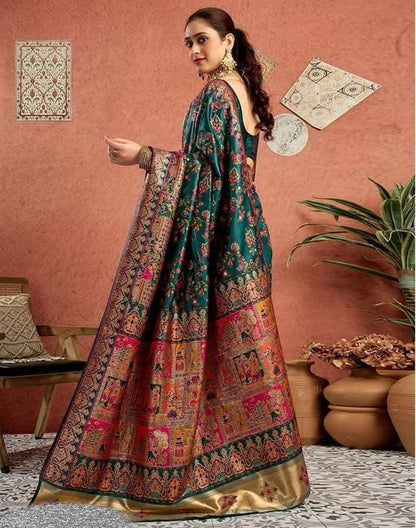 Women's Dark Green Patola Silk Saree with Traditional Floral Weaving & Rich Heritage Pallu