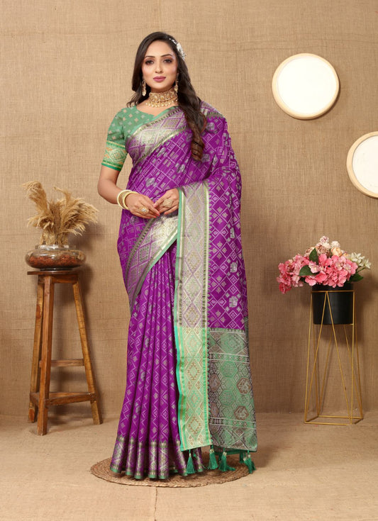 Purple & Green Color Women's Soft Patola Silk meenakari weawing motifs with Rich Zari Pallu and contrast border with Tessels.