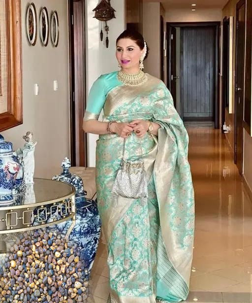 Women's Mint Green Soft Silk Banarasi Saree with Silver Zari Woven Border & Unstitched Blouse