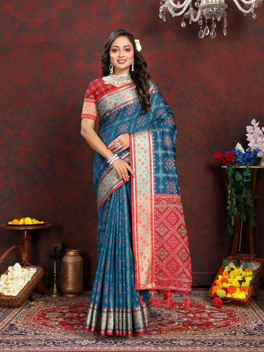 Blue & Red Color Women's Soft Patola Silk meenakari weawing motifs with Rich Zari Pallu and contrast border with Tessels.