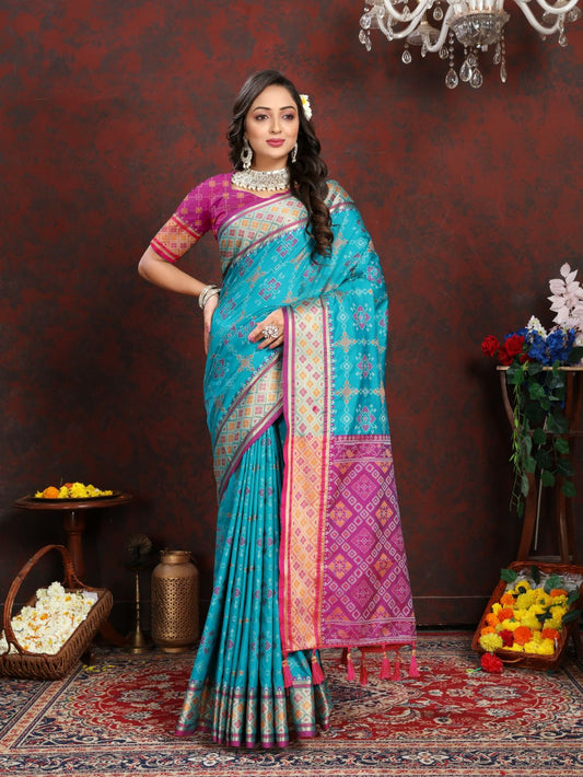 Light Blue & Pink Color Women's Soft Patola Silk meenakari weawing motifs with Rich Zari Pallu and contrast border with Tessels.