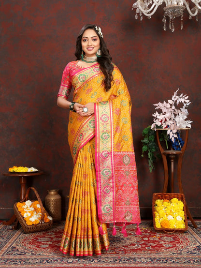 Mustered & Red Women's Soft Patola Silk meenakari weawing motifs with Rich Zari Pallu and contrast border with Tessels.