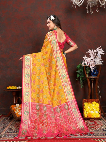 Mustered & Red Women's Soft Patola Silk meenakari weawing motifs with Rich Zari Pallu and contrast border with Tessels.