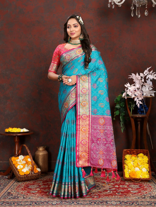 Light Blue & Pink Women's Soft Patola Silk meenakari weawing motifs with Rich Zari Pallu and contrast border with Tessels.